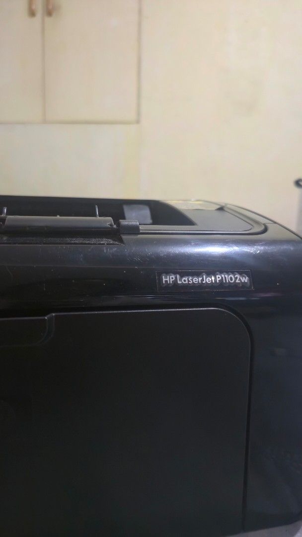 HP LaserJet P1102w Printer (Category: Printers, Scanners & Copiers) located in Cavite. Submitted by tepidelarosa (Listing ID 1468352335, Image 1). Description: - Model: HP LaserJet P1102w Wireless Laser Printer - Finish: Sleek black with a compact, space-saving footprint - Condition: Powers on perfectly and prints crisp text documents - Features: Fold-out tray extensions for easy paper loading - Inclusions: Toner cartridge already installed insid