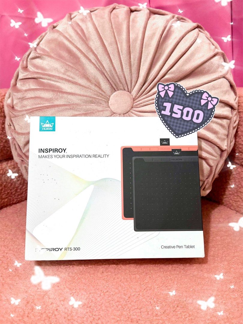 Huion Inspiroy RTS-300 Creative Pen Tablet (Category: Laptops & Notebooks) located in Adams. Submitted by precurekaei (Listing ID 1468403878, Image 1). Description: - Item: Huion Inspiroy RTS-300 Creative Pen Tablet - Color: Coral Pink and Black - Condition: Complete set in original packaging - Inclusions: Tablet, stylus pen, pen holder, adapters, and quick start guide - Best for: Digital art, sketching, and online teaching .