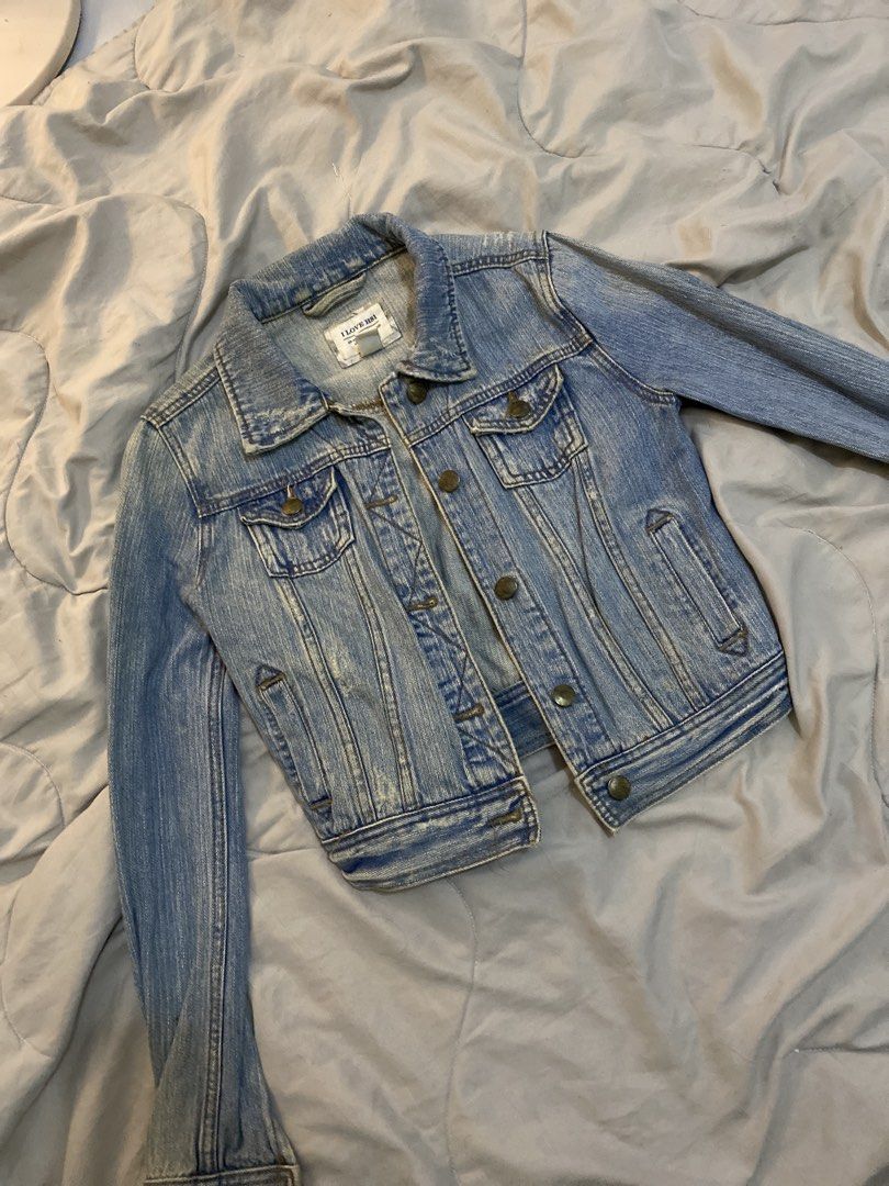 I Love H81 Light Wash Denim Jacket Size S (Category: Coats, Jackets and Outerwear) located in Manila. Submitted by newkkmora98454 (Listing ID 1468314989, Image 2). Description: - Brand: I Love H81 - Size: Small (Tag reads 160/84A) - Wash: Light wash denim - Design: Classic button-up front with metal hardware - Pockets: Dual chest pockets and convenient side welt pockets - Details: Trendy distressed accents on the collar and hems - Origin: Made in