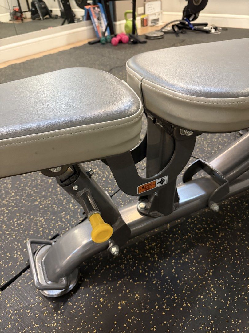 Impulse Adjustable Fitness Weight Bench (Category: Weights & Dumbbells) located in Manila. Submitted by mjaneco7 (Listing ID 1468380830, Image 3). Description: - Brand: Impulse IT7011 Multi Adjustable Bench - VG lightly used conditiion - Frame: Solid metal frame in dark grey with protective rubber feet - Cushioning: Comfortable grey padded cushions with embossed logo - Adjustability: Yellow adjustment pins on both ends for quick angle changes - P