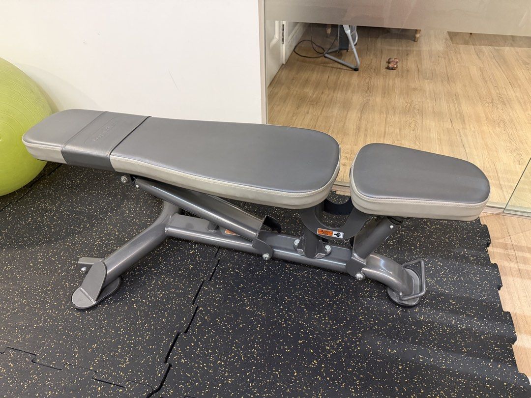 Impulse Adjustable Fitness Weight Bench (Category: Weights & Dumbbells) located in Manila. Submitted by mjaneco7 (Listing ID 1468380830, Image 1). Description: - Brand: Impulse IT7011 Multi Adjustable Bench - VG lightly used conditiion - Frame: Solid metal frame in dark grey with protective rubber feet - Cushioning: Comfortable grey padded cushions with embossed logo - Adjustability: Yellow adjustment pins on both ends for quick angle changes - P