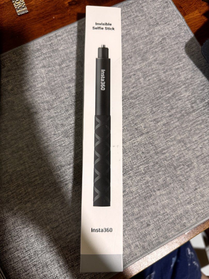 Insta360 Invisible Selfie Stick (Category: Tripods & Monopods) located in Manila. Submitted by ivoryscloset (Listing ID 1468302866, Image 1). Description: - 100% Original Insta360 invisible selfie stick in black (original box included) - Textured grip handle for secure and comfortable holding - Retractable design easily extends for wide-angle and 360 shots - Universal standard screw mount compatible with most action cameras.