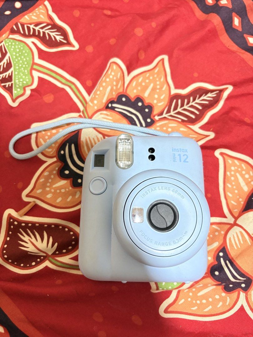 INSTAX MINI 12 (Category: Cameras) located in Manila. Submitted by riality_06 (Listing ID 1468391076, Image 1). Description: UNIT ONLY bought last september, rfs: barely used .