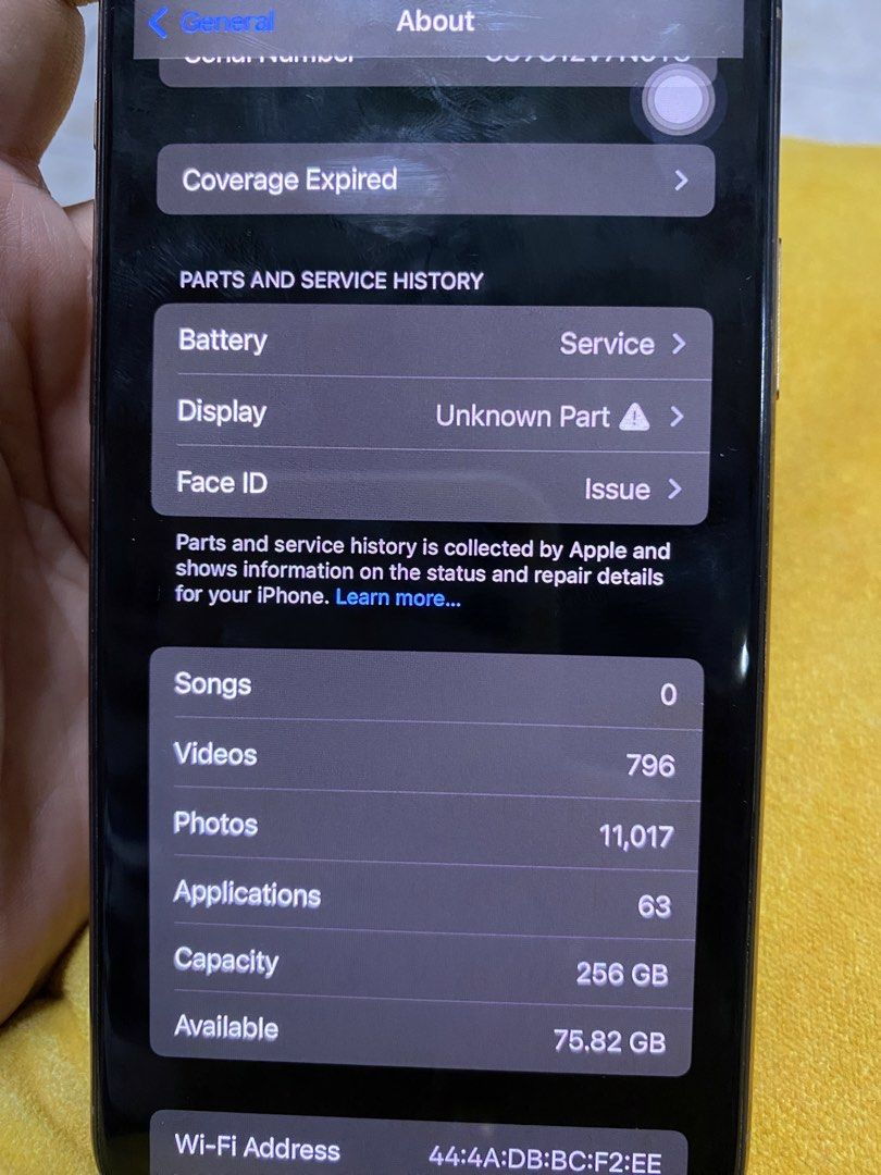 Iphone 11 pro 256gb (Category: iPhone 11 Series) located in San Mateo. Submitted by domski23 (Listing ID 1468288922, Image 2). Description: - Brand/Model: iPhone 11 Pro - Storage Capacity: 256GB - Color: Gold - Condition Notes: Battery needs service, display shows 'Unknown Part' warning, Face ID has an issue - Physical Appearance: Gentle signs of use around the frame as shown in photos - Meetup Location: SM City San Mateo, Rizal 73bh .