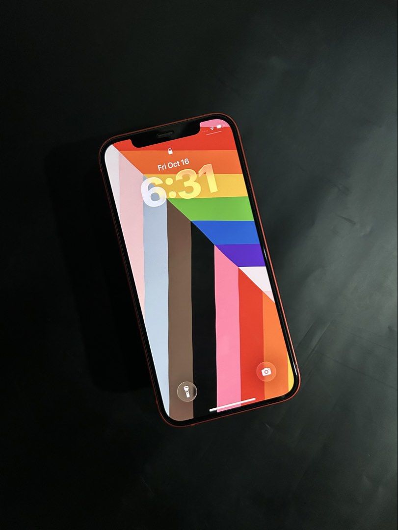 Iphone 12 (Category: iPhone 12 Series) located in Manila. Submitted by bigsmoke.038 (Listing ID 1468383770, Image 1). Description: For sale Iphone 12 64gb Smartlocked 74bh No issue No repair Comes with phone case and charger Meetups: manila can do halfway.