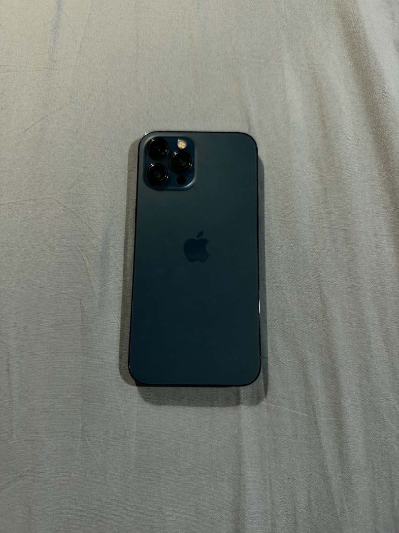 Iphone 12 Pro Max Pacific Blue (Category: iPhone 12 Series) located in Obando. Submitted by pepperooshop (Listing ID 1468459524, Image 1). Description: - Model: iPhone 12 Pro Max - Storage: 128GB - Color: Pacific Blue - Condition: Pre-owned, well-maintained, clean screen and back body as shown in photos - Features: Triple camera system, large OLED display, premium glass and stainless steel design - Meetup -Price still negotiable.