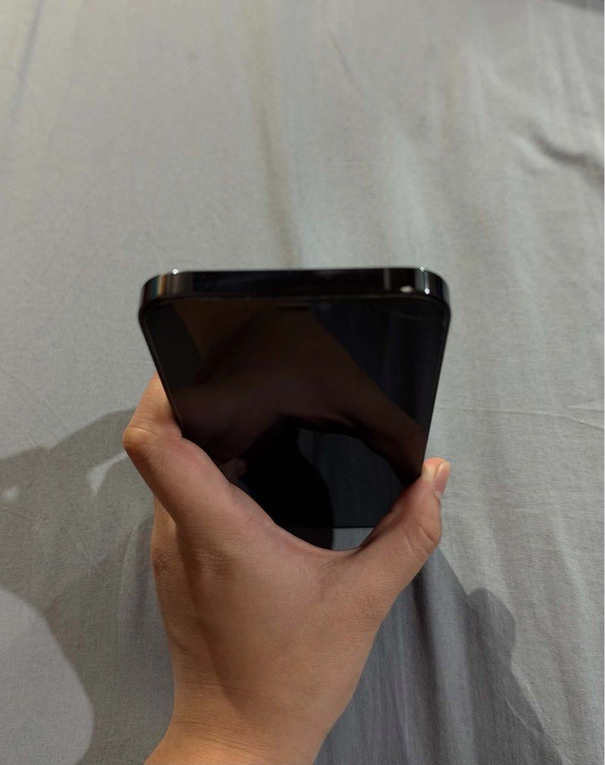 Iphone 12 Pro Max Pacific Blue (Category: iPhone 12 Series) located in Obando. Submitted by pepperooshop (Listing ID 1468459524, Image 3). Description: - Model: iPhone 12 Pro Max - Storage: 128GB - Color: Pacific Blue - Condition: Pre-owned, well-maintained, clean screen and back body as shown in photos - Features: Triple camera system, large OLED display, premium glass and stainless steel design - Meetup -Price still negotiable.