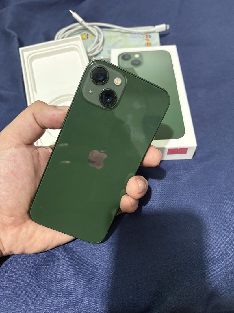 iPhone 13 Green 128GB (Category: iPhone 13 Series) located in San Pedro. Submitted by tapsyy (Listing ID 1468312859, Image 2). Description: FOR SALE OR SWAP ADD KA IF LOWER ADD AKO IF HIGHER IPHONE 13 GREEN 128GB 84% BATTERY HEALTH (ORIGINAL) FACTORY UNLOCKED (OPENLINE) ZP/A LOCAL VARIANT POWERMAC PURCHASED (OCTOBER 2, 2024) FACE ID WORKING TRUETONE WORKING COMPLETE PACKAGE (ORIGINAL BOX & CORD) NO REPAIR HISTORY (ALL ORIGINAL PARTS) PRISTINE CON