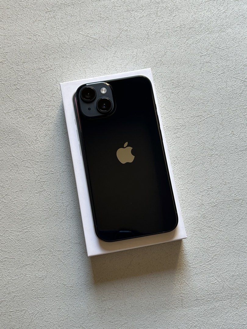 iPhone 14 128GB Midnight (Category: iPhone 14 Series) located in Quezon City. Submitted by apple__avenue (Listing ID 1468299012, Image 2). Description: Selling brand-new condition iPhone 14, 128GB, NTC, Factory Unlocked (Openline), & Midnight color. Bought from PowerMac & Under warranty until June 2027. Battery health is 100% & 14 cycle count only. With Replacement Box, manuals, cord, case and power brick. Installed with screen protector Meetups: