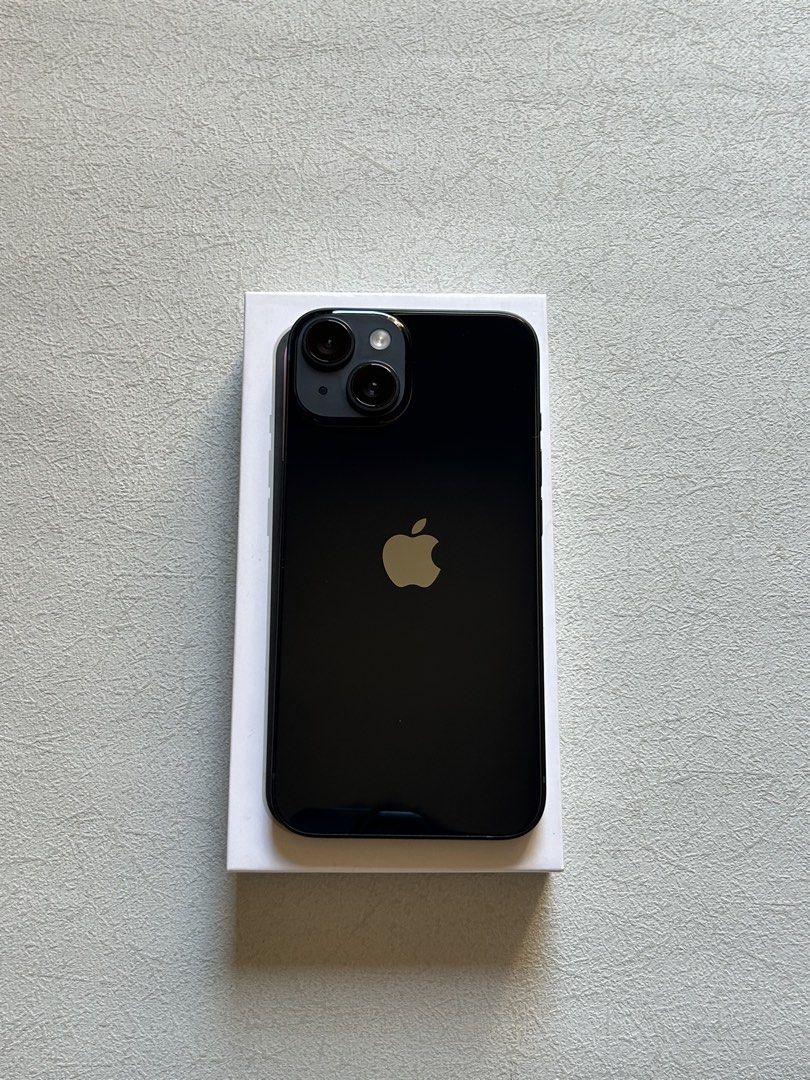 iPhone 14 128GB Midnight (Category: iPhone 14 Series) located in Quezon City. Submitted by apple__avenue (Listing ID 1468299012, Image 1). Description: Selling brand-new condition iPhone 14, 128GB, NTC, Factory Unlocked (Openline), & Midnight color. Bought from PowerMac & Under warranty until June 2027. Battery health is 100% & 14 cycle count only. With Replacement Box, manuals, cord, case and power brick. Installed with screen protector Meetups: