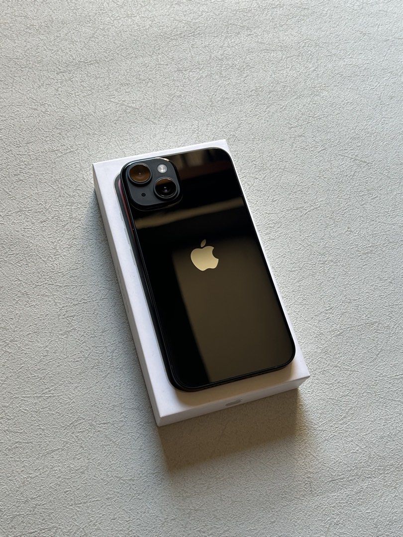 iPhone 14 128GB Midnight (Category: iPhone 14 Series) located in Quezon City. Submitted by apple__avenue (Listing ID 1468299012, Image 3). Description: Selling brand-new condition iPhone 14, 128GB, NTC, Factory Unlocked (Openline), & Midnight color. Bought from PowerMac & Under warranty until June 2027. Battery health is 100% & 14 cycle count only. With Replacement Box, manuals, cord, case and power brick. Installed with screen protector Meetups: