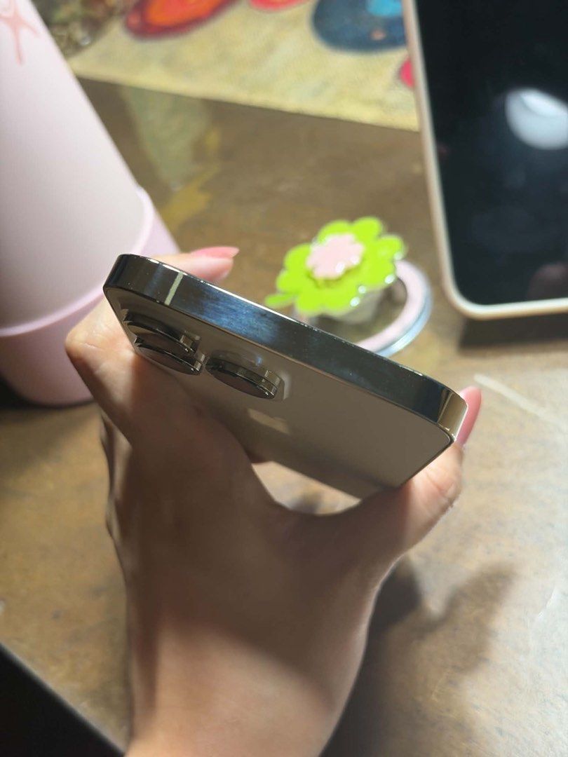 Iphone 14 Pro Max (Category: iPhone 14 Series) located in Makati City. Submitted by just4you1111 (Listing ID 1468432539, Image 1). Description: For sale negotiable With box and lightning cable Gold colorway 128gb 76% batt health No parts replaced yet.