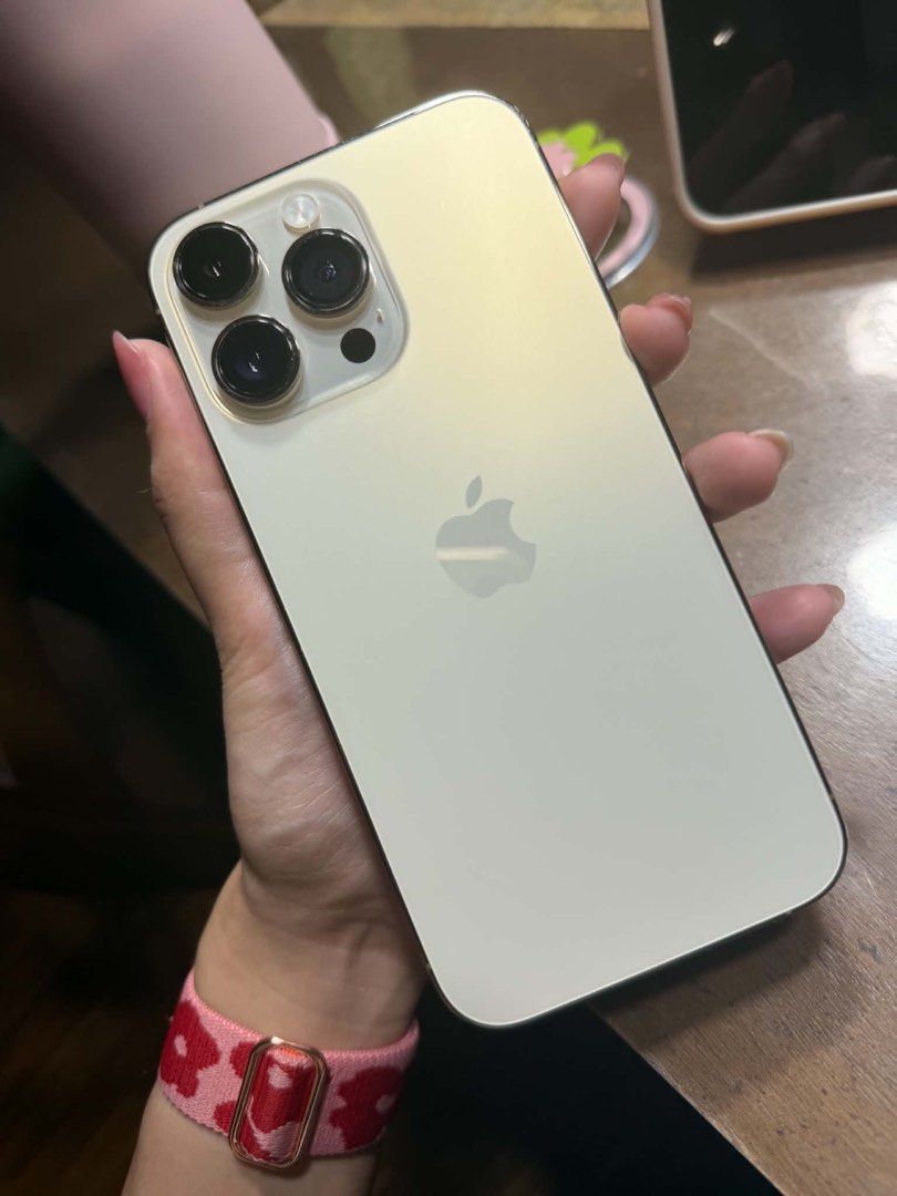 Iphone 14 Pro Max (Category: iPhone 14 Series) located in Makati City. Submitted by just4you1111 (Listing ID 1468432539, Image 3). Description: For sale negotiable With box and lightning cable Gold colorway 128gb 76% batt health No parts replaced yet.