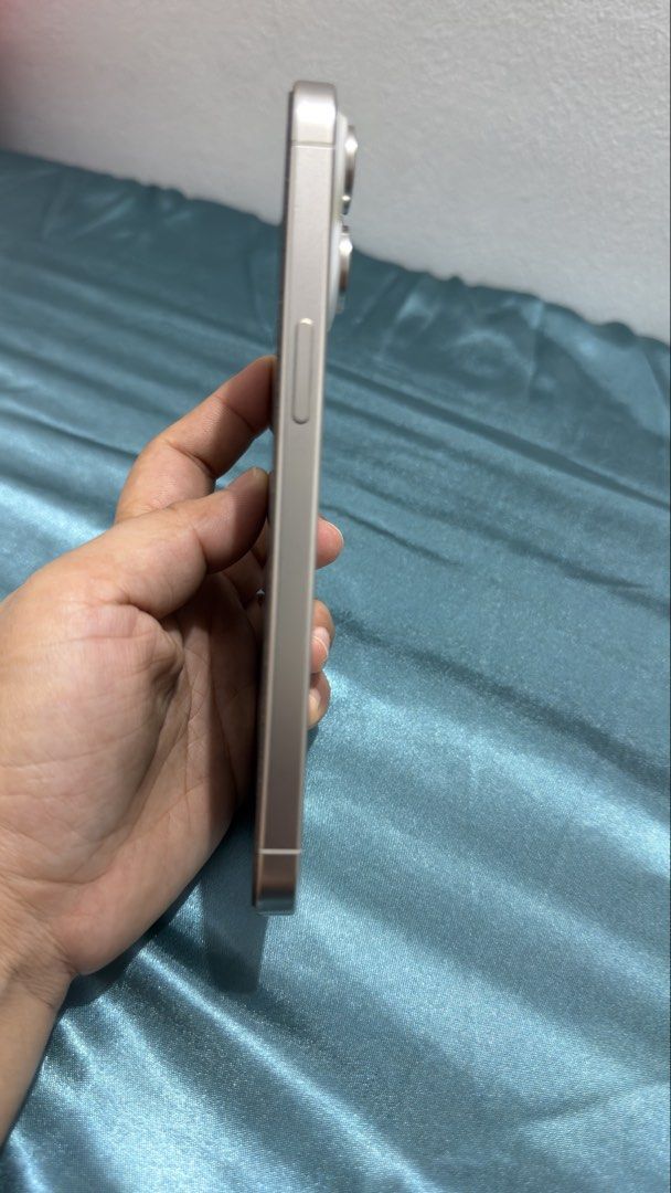 IPHONE 15 PRO MAX (Category: iPhone 15 Series) located in Manila. Submitted by prelovedbydarkangel (Listing ID 1468452339, Image 2). Description: For Sale Iphone 15 Pro Max 256gb White Titanium Smooth Condition No Fades, No Scratches, No Dents. * 74% Battery Health * NTC Approved * No Issue Complete Package: -Unit -Original Box Same Imei -Sim Ejector -Manuals -Apple Sticker -Charger RFS. Upgrade Meetup: Near UST Payment: Online Bank Transfer or G