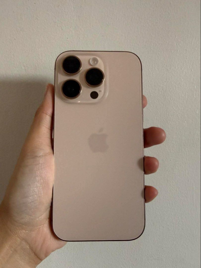 Iphone 16 pro 256 gb - Desert Titanium (Category: iPhone 16 Series) located in Manila. Submitted by jdees_ (Listing ID 1468326518, Image 2). Description: Bought it from PowerMac Last year Inclusions : - Original cord & sim ejector - BH 87% - No scratches & dents.