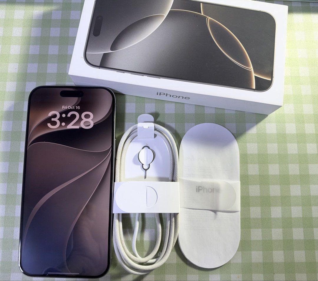 iPhone 16 Pro Max (Category: iPhone 16 Series) located in Quezon City. Submitted by strawtaekoo (Listing ID 1468382179, Image 3). Description: - Brand/Model: Apple iPhone 16 Pro Max - Color: Natural Titanium - Storage Capacity: 256GB - Condition: Pristine, well-maintained - Included Accessories: Original box, USB-C cable, SIM ejector pin - Features: Pro camera system, premium titanium build, stunning edge-to-edge display • Minimal to no dents • L