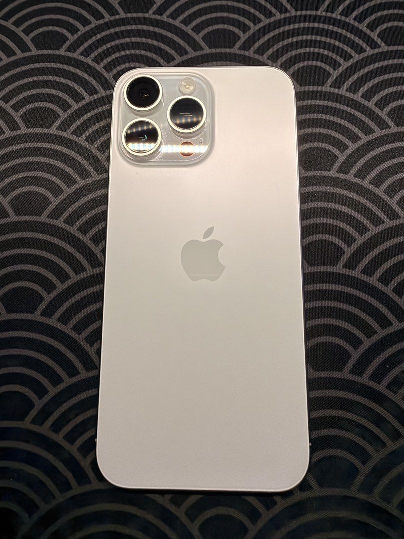 iPhone 16 Pro Max (Smart Locked) (Category: iPhone 16 Series) located in Quezon City. Submitted by oddmountain_c1f8e1 (Listing ID 1468460655, Image 1). Description: Selling > iPhone 16 Pro Max Details: Smart locked 256GB White titanium. Complete with box same IMEI. Cable not used. No scratch. No issues. Can pass as brand new. Battery Health 92% Selling for 40,000. Pickup within Cubao. RFS: Upgraded.