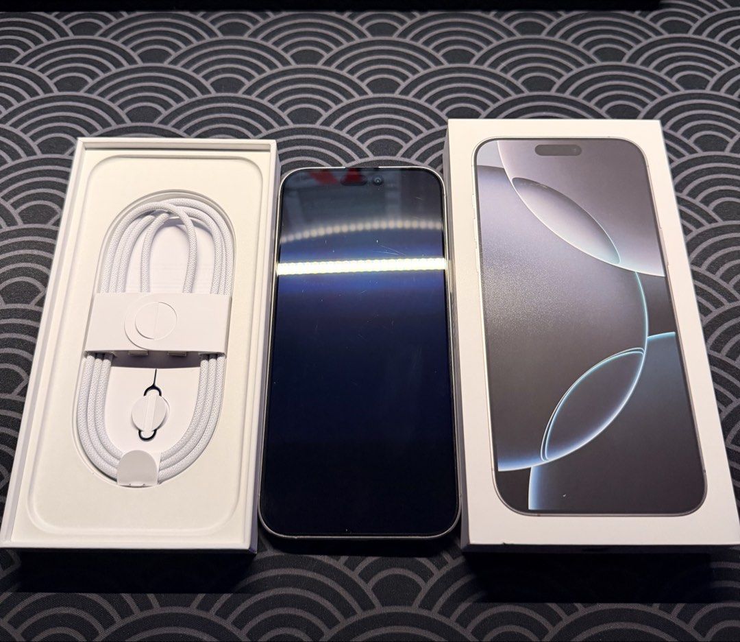 iPhone 16 Pro Max (Smart Locked) (Category: iPhone 16 Series) located in Quezon City. Submitted by oddmountain_c1f8e1 (Listing ID 1468460655, Image 2). Description: Selling > iPhone 16 Pro Max Details: Smart locked 256GB White titanium. Complete with box same IMEI. Cable not used. No scratch. No issues. Can pass as brand new. Battery Health 92% Selling for 40,000. Pickup within Cubao. RFS: Upgraded.