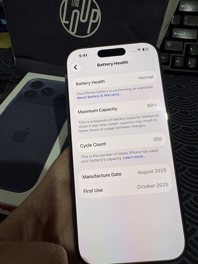 Iphone 17 Pro (Category: iPhone 17 Series) located in Pasig City. Submitted by polrz (Listing ID 1468476397, Image 3). Description: - Model: iPhone 17 Pro - Color: Deep blue - Battery Health: 89% (350 cycle counts) - Timeline: Manufactured August 2025, First used October 2025 - Condition: Works great, smooth performance - Inclusions: Original box, The Loop paper bag, and clear MagSafe case.