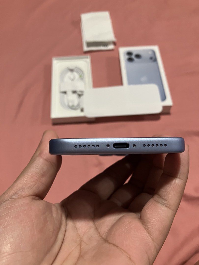 iPhone 18 Pro Max (Category: iPhone 18 Series) located in San Juan City. Submitted by darnelicous (Listing ID 1468419603, Image 3). Description: - Color: Light blue - Condition: Unused (opened only to check) - Battery Health: 100% with zero cycle count - Clean screen, spotless sides, and pristine ports - Comes with original box, charging cable, and receipt.