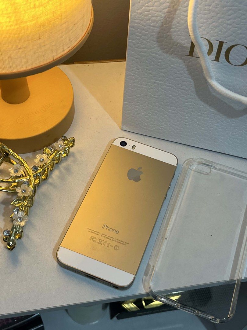 Iphone 5s Gold 16GB (Category: iPhone SE Series) located in Bulacan. Submitted by jadedelosreyes (Listing ID 1468411396, Image 3). Description: 🎀 iPhone 5s Gold 16GB — For Sale ♡ ♡ Touch ID / fingerprint — working ♡ SIM card compatible ♡ Front & back cameras — working ♡ Smooth screen & battery ♡ Can still download apps like Instagram, Facebook, Messenger & TikTok ♡ Perfect for that vintage camera aesthetic ♡ Slight dent on the side, but doesn’t 