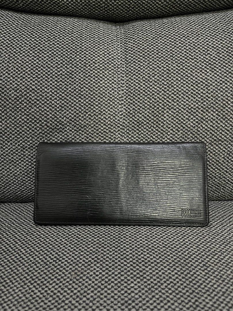 Issey Miyake Long Leather Wallet (Category: Wallets & Card Holders) located in Baguio. Submitted by whatthestore (Listing ID 1468458590, Image 1). Description: .