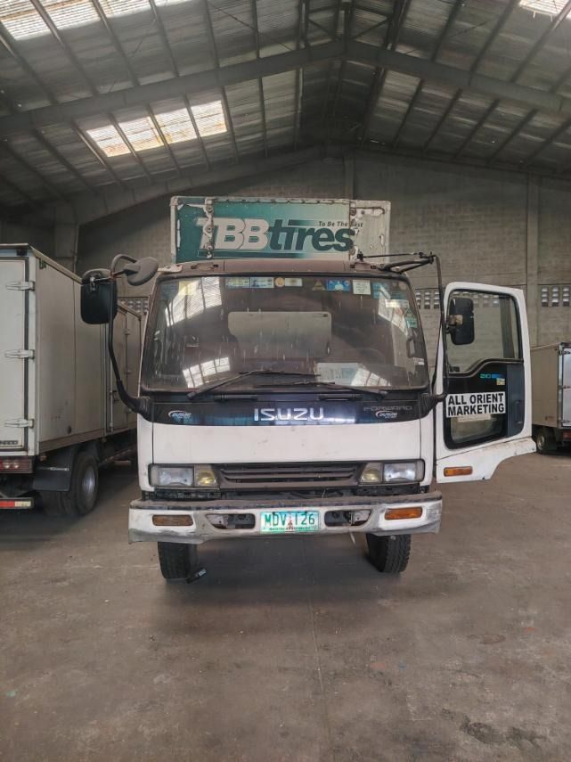 Isuzu Elf Minibus (Category: Used Cars) located in Quezon City. Submitted by bignaytyres (Listing ID 1468304053, Image 2). Description: - FOR SALE: ISUZU 6-WHEELER ALUMINUM VAN TRUCK - ₱600,000 NEGOTIABLE GOOD CONDITION • COMPANY-OWNED • READY FOR BUSINESS Selling our Isuzu Aluminum Van Truck, ideal for delivery, hauling, logistics, distribution, trucking business, and company use. -Isuzu 6-Cylinder Diesel – 6HH1 Engine - Year Model: 2000 -Alumin