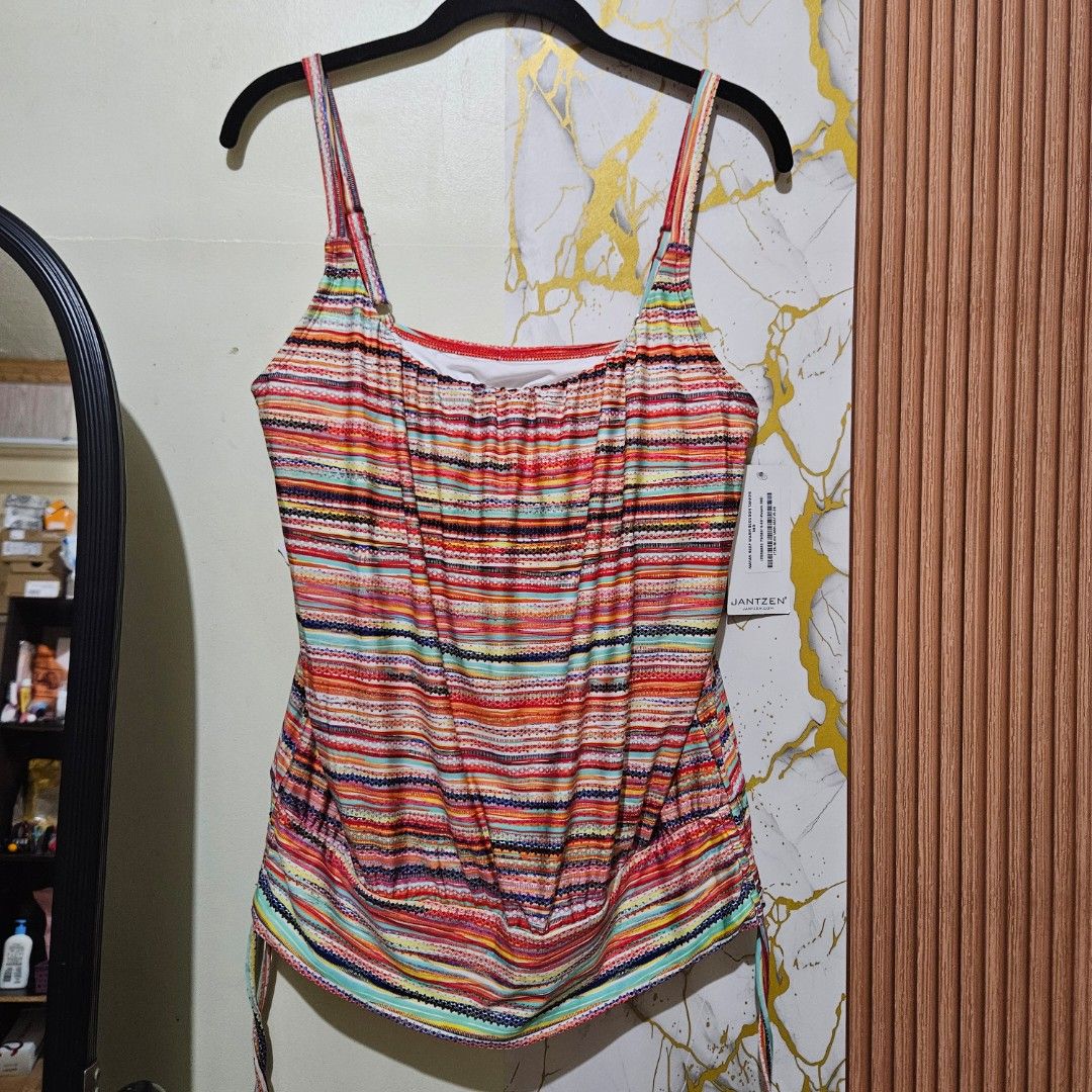 Jantzen blouson-style tankini top designed with a vibrant, multicolored horizontal stripe pattern medium (Category: Bikinis & Swimsuits) located in Digos. Submitted by marianfinds (Listing ID 1468329312, Image 2). Description: medium-large wired bra ♡Authentic/preloved item. Actual photos posted. Please check all photos and details carefully before purchasing. ●Color may vary due to lighting Walk in buyers are always welcome!✨️ 📍Location: Lim ex
