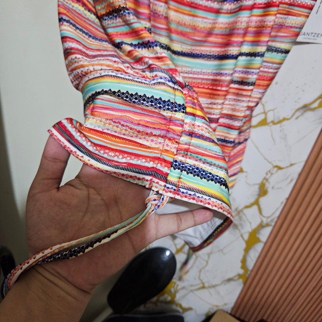 Jantzen blouson-style tankini top designed with a vibrant, multicolored horizontal stripe pattern medium (Category: Bikinis & Swimsuits) located in Digos. Submitted by marianfinds (Listing ID 1468329312, Image 3). Description: medium-large wired bra ♡Authentic/preloved item. Actual photos posted. Please check all photos and details carefully before purchasing. ●Color may vary due to lighting Walk in buyers are always welcome!✨️ 📍Location: Lim ex