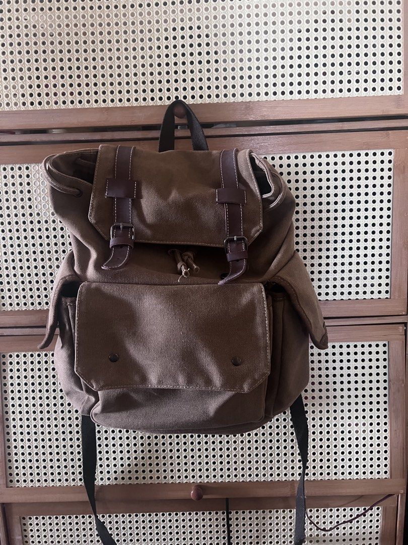 Japanese Vintage Brown Canvas Backpack (Category: Backpacks) located in Mandaluyong City. Submitted by jillylilly (Listing ID 1468335099, Image 1). Description: Thrifted in Osaka. Japan-made. Made with a sturdy canvas. Magnets snap shut. Perfect for travel or school..