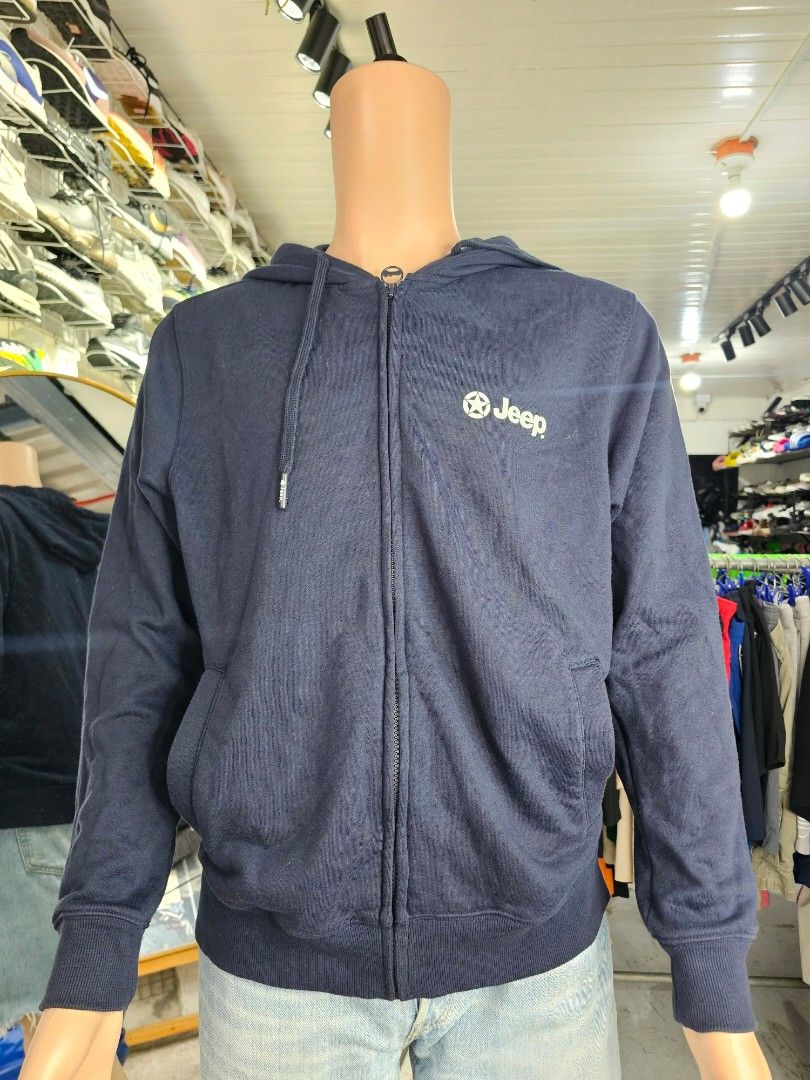 Jeep full-zip hooded sweatshirt (Category: Coats, Jackets and Outerwear) located in Baguio. Submitted by kayeonlineshop (Listing ID 1468325242, Image 2). Description: -navy blue Jeep full-zip hooded sweatshirt (hoodie) featuring the Jeep logo and star emblem on the left chest.