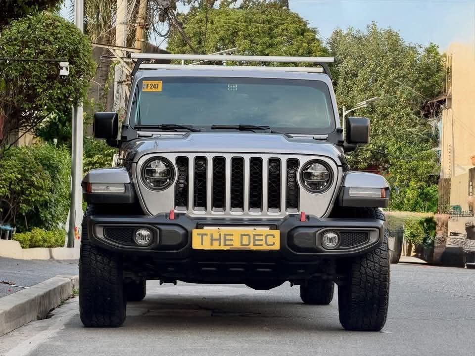 Jeep Gladiator Rubicon Auto (Category: Used Cars) located in Manila. Submitted by quality_cars (Listing ID 1468468622, Image 1). Description: FOR SALE - Guaranteed Best Buy! Brand: Jeep Model: Gladiator Rubicon Year Model: 2021 Model Transmission: Automatic Color: Black Fuel Type: Gas Mileage: 34K Mileage Ending Plate: “7” Thursday Coding MY SELLING PRICE: 3,345,000 Negotiable Trade In Ok, Financing Ok All Stock Except for Tyres Very Cold AC Very