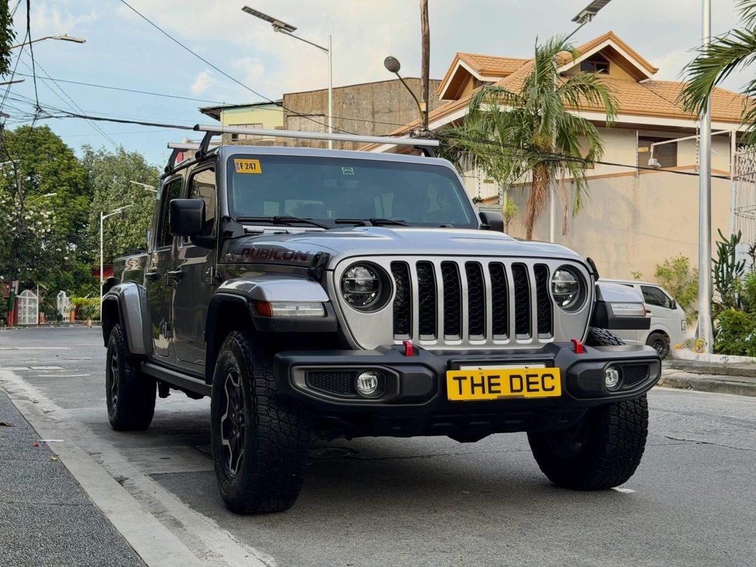 Jeep Gladiator Rubicon Auto (Category: Used Cars) located in Manila. Submitted by quality_cars (Listing ID 1468468622, Image 2). Description: FOR SALE - Guaranteed Best Buy! Brand: Jeep Model: Gladiator Rubicon Year Model: 2021 Model Transmission: Automatic Color: Black Fuel Type: Gas Mileage: 34K Mileage Ending Plate: “7” Thursday Coding MY SELLING PRICE: 3,345,000 Negotiable Trade In Ok, Financing Ok All Stock Except for Tyres Very Cold AC Very