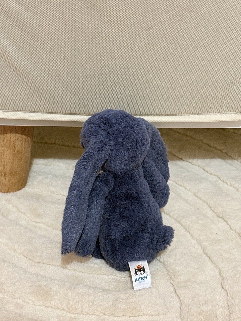 Jellycat bashful navy bunny small (Category: Plushies & Soft Toys) located in Tagaytay City. Submitted by denalycoco51 (Listing ID 1468385473, Image 2). Description: Please manage expectations before claiming! 💕 • NO REFUND / NO EXCHANGE — all sales are final. • ITEM CONDITION: Good as new, Only used for display. • Authenticity guaranteed, Retired • Please check all photos & descriptions carefully. • Payment within 24 hours unless otherwise agre