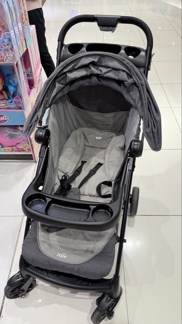 JOIE MUZE LX BABY STROLLER (Category: Other Kids Furniture) located in Manila. Submitted by dee.s.o (Listing ID 1468494900, Image 1). Description: ✨ Needs cleaning ✨ Overall, still in good condition ✨ Sturdy and heavy-duty ✨ Comes with a canopy, safety harness, and snack tray with cup holders Still functional and suitable for everyday use! 😊 Selling as is. Feel free to message me for inquiries!.
