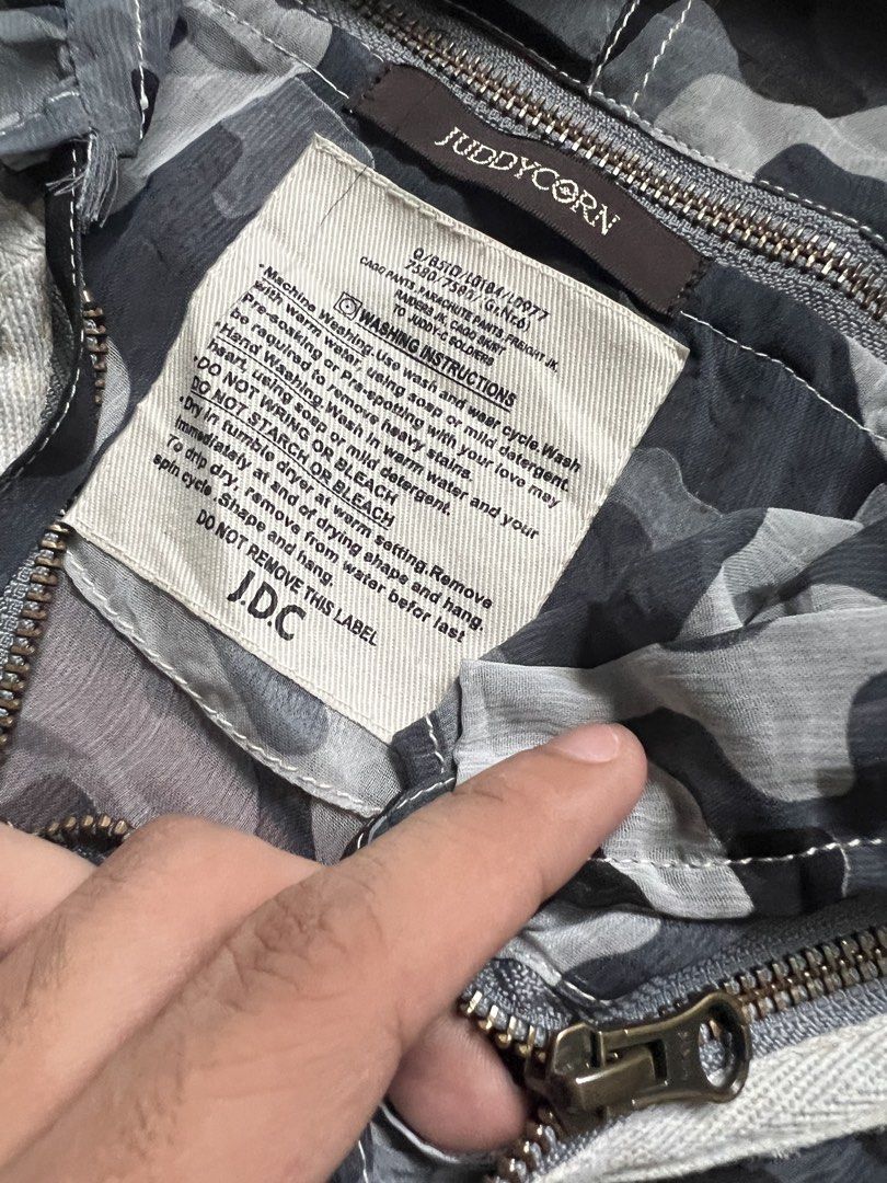 JUDDYCORN ( J.D.C ) (Category: Coats, Jackets and Outerwear) located in Lucena. Submitted by proxyhere (Listing ID 1468442849, Image 3). Description: JuddyCorn ( J.D.C ) sister company of goa, the parachute jacket is mesh camouflage, hoodie is removable. length 27 width 20.