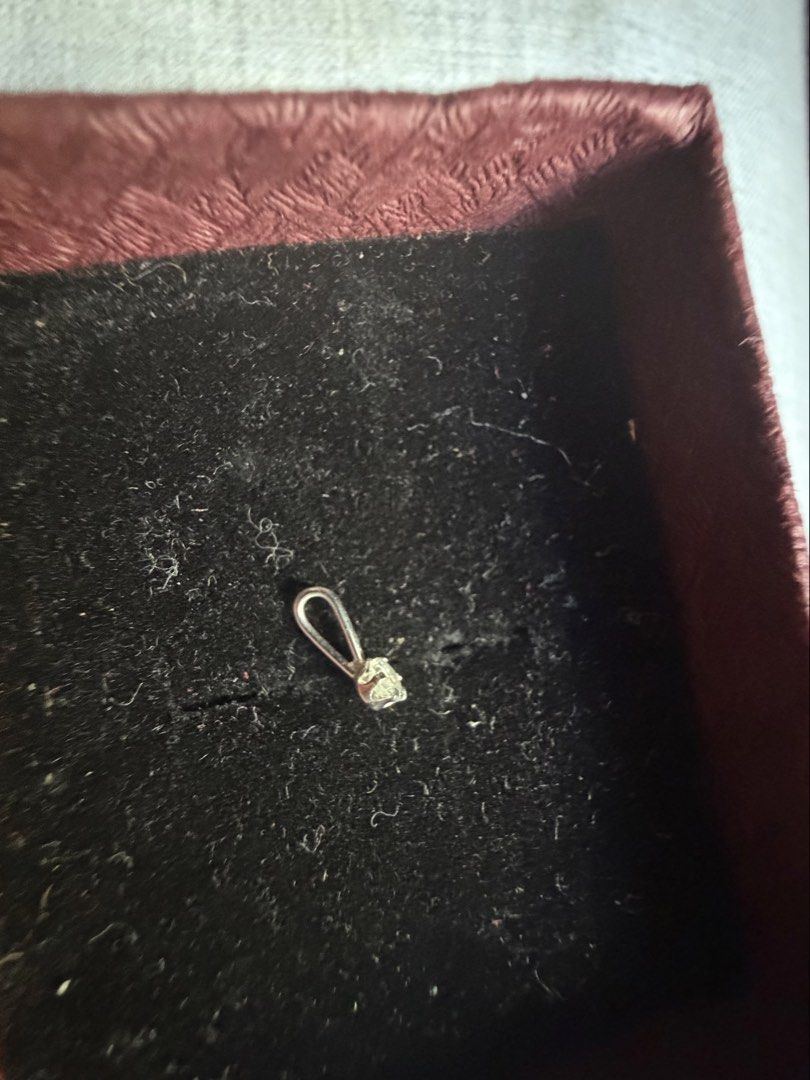 K18 0.10ct Natural Diamond Pendant (Category: Necklaces) located in Las Pinas. Submitted by cath_mill (Listing ID 1468357362, Image 3). Description: - Material: Genuine K18 White Gold (stamped) - Stone: 0.10 carat natural diamond with round brilliant cut - Setting: Secure prong setting - Hallmarks: Stamped K18 and 0.10ct on the back - Inclusion: Includes official diamond identification report / certificate (#3040848) - Packaging: Comes in a class