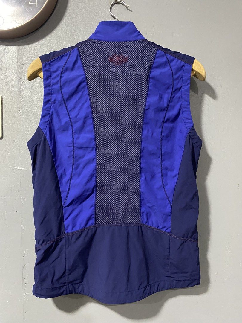 K2 Outdoor Athletic Vest (Category: Vests) located in Tanay. Submitted by judevalcorza (Listing ID 1468286938, Image 2). Description: - Brand/Model: K2 Outdoor Vest - Colorway: Blue and purple with contrasting zippers - Size: 95 (Tag on collar) Medium 26/20 - Features: Full zip front closure, multiple zippered pockets on chest and lower front - Back Design: Breathable mesh panel down the middle - Ideal For: Hiking, running, and lightweight techni