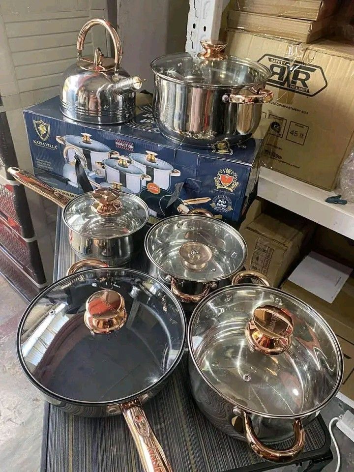 KAISAVILLA COOKWARE SET (Category: Cookware & Accessories) located in Manila. Submitted by berdenmarl01688 (Listing ID 1468483887, Image 2). Description: - Complete 12-piece Kaisa Villa cookware set - Shiny stainless steel finish with elegant rose gold handles and knobs - Induction-compatible bottoms for all pieces - Includes multiple pots with glass lids, a marble-coated frying pan, and a whistling kettle - Comes with the original blue storage b
