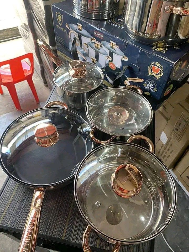 KAISAVILLA COOKWARE SET (Category: Cookware & Accessories) located in Manila. Submitted by berdenmarl01688 (Listing ID 1468483887, Image 3). Description: - Complete 12-piece Kaisa Villa cookware set - Shiny stainless steel finish with elegant rose gold handles and knobs - Induction-compatible bottoms for all pieces - Includes multiple pots with glass lids, a marble-coated frying pan, and a whistling kettle - Comes with the original blue storage b