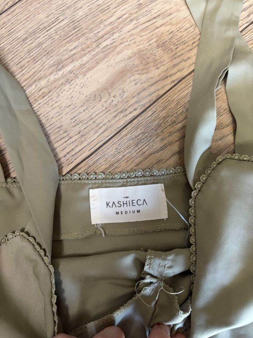Kashieca Sage Green Tie Strap Tank Top (Category: Sleeveless) located in Mandaluyong City. Submitted by christinejoylam (Listing ID 1468355928, Image 2). Description: - super nice to wear!! Good quality as well - rfs: a bit loose on me already.