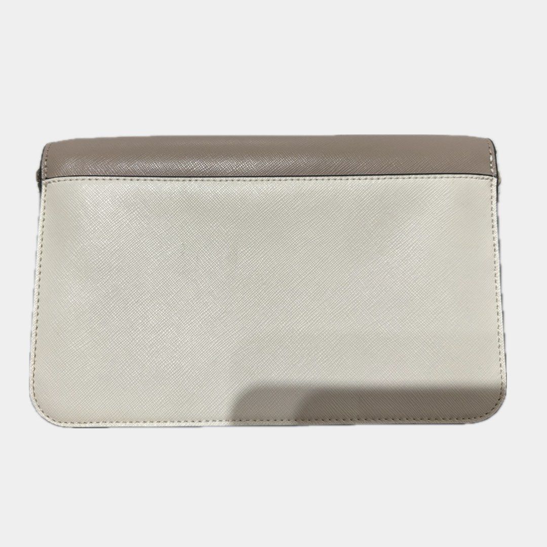 Kate Spade madison flap crossbody bag (Category: Cross-body Bags) located in Paranaque City. Submitted by annvzsn (Listing ID 1468498949, Image 3). Description: Color: beige/white/black Size: medium Material: leather Bought in: US (physical store) Condition: like new Details: - Ideal for both daytime and evening use - Genuine saffiano leather - Gold chain detail - Detachable strap for versatile wear - Magnetic snap closure - Interior zippered poc
