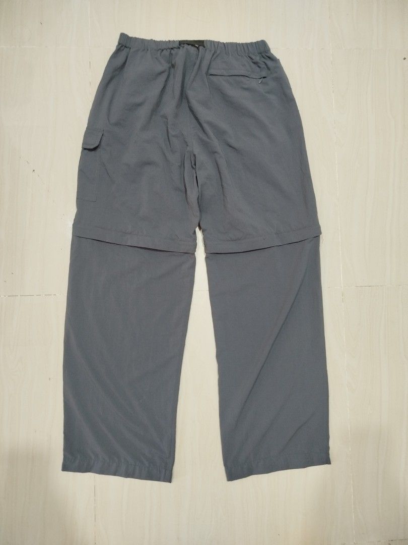 Kathmandu Convertible Cargo trekpants (Category: Trousers) located in Aroroy. Submitted by dr0p-a-dr1p (Listing ID 1468330325, Image 2). Description: Waist: 30-36 Length: 40 - Brand: Kathmandu - Size: Large (L) - Color: Dark Grey - Material: 100% Nylon - Style: Convertible cargo pants (zips off into shorts) - Features: Elastic waistband with integrated buckle belt, side cargo pockets, and rear zipper pocket - Ideal for: Hiking, traveling, and out