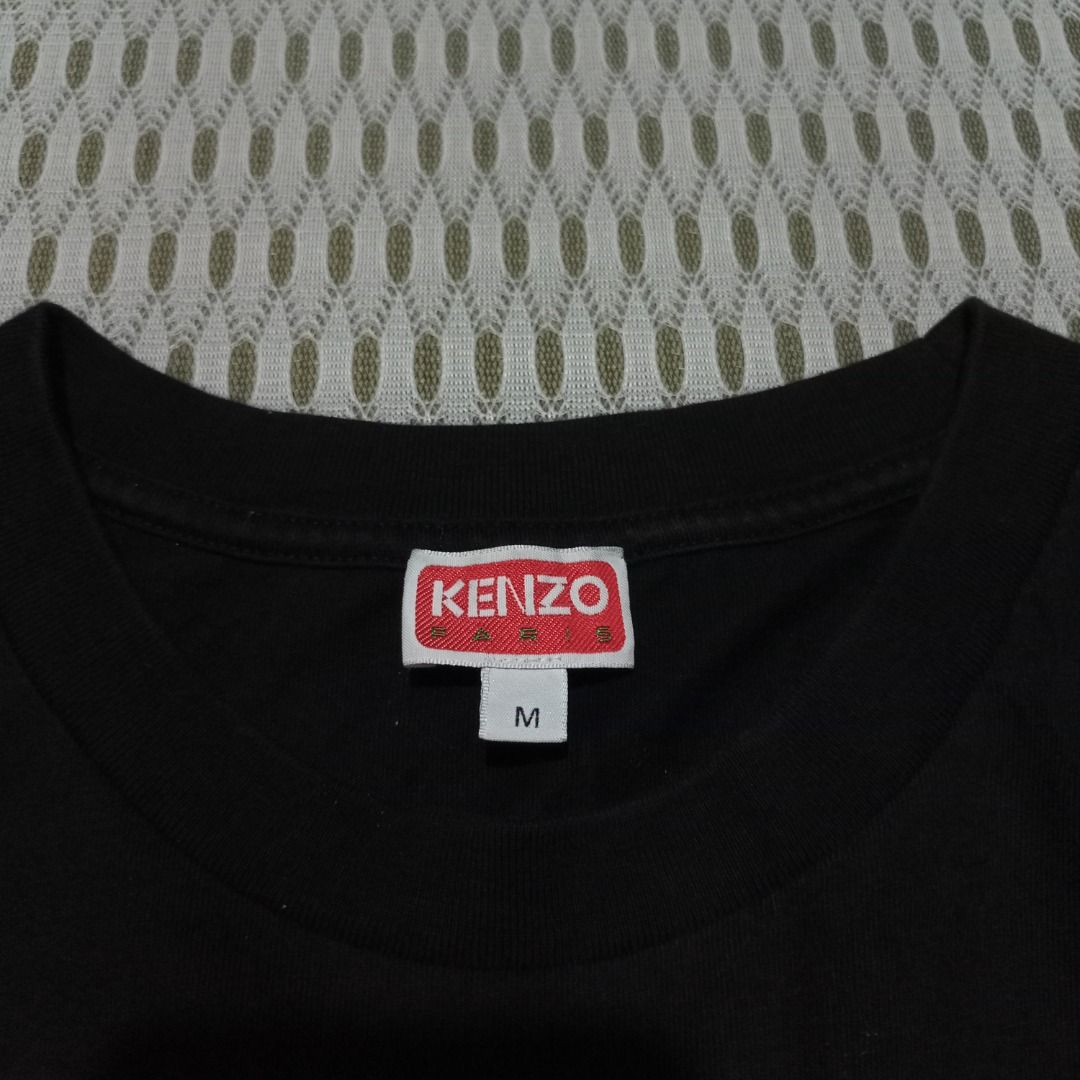 Kenzo Nigo Boke Flower Crest (Category: Shirts) located in General Santos City (Dadiangas). Submitted by collection_9500 (Listing ID 1468477841, Image 3). Description: Kenzo Nigo Boke Flower Crest 21 x 29 Large Excellent except minimalbleachstain Gensan loc Pm for inquiries All are thrifted items.