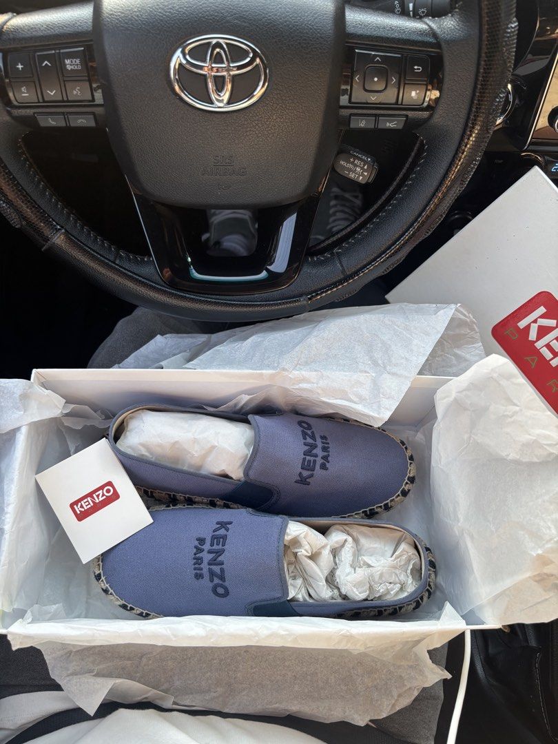 Kenzo Paris Lavender Espadrilles (Category: Casual Shoes) located in Pasig City. Submitted by borissirob (Listing ID 1468402139, Image 1). Description: - Brand: Kenzo Paris - Item: Canvas espadrilles - Color: Lavender - Size: 42 - Condition: Brand new with tag and original box - Features: Slip-on style, embroidered logo branding, and jute-trimmed rubber sole.