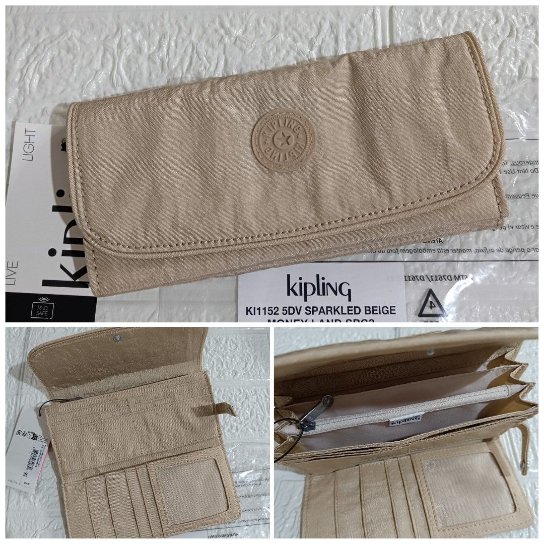 Kipling Money Land Snap Wallet (Category: Wallets & Card holders) located in Mandaluyong City. Submitted by sheila_snapshoppe (Listing ID 1468342747, Image 2). Description: 💯% guaranteed original bought in Kipling US 🇺🇸 Kipling Money Land Snap Wallet size: 7.25" x 4" x 1".