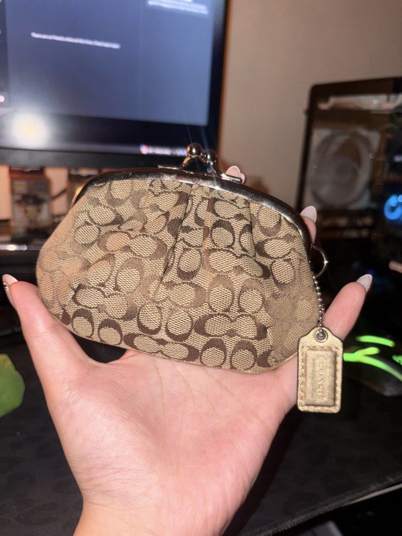 Kisslock Coach (Category: Wallets & Card Holders) located in Manila. Submitted by cocorua.bags (Listing ID 1468383887, Image 1). Description: .