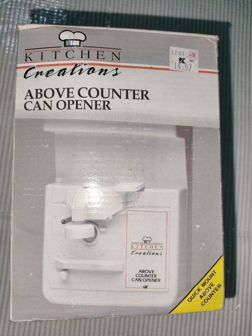 Kitchen Creations Above Counter Can Opener (Category: Cookware & Accessories) located in Manila. Submitted by reascheyss51406 (Listing ID 1468320588, Image 2). Description: - Brand: Kitchen Creations electric can opener in clean white - Space-saving: Mounts easily under cabinets to keep your counters clear - Fully automatic: Effortlessly pierces cans, holds them in place, and includes a handy lid magnet - Easy maintenance: Features a removable cu
