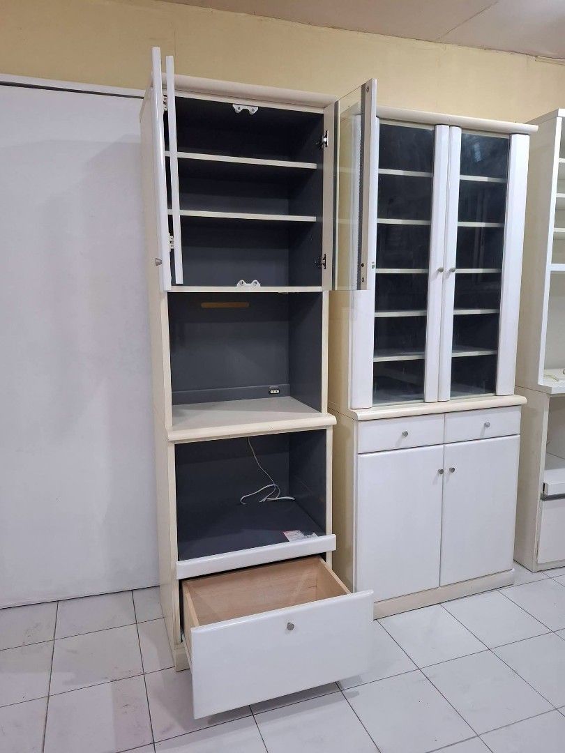 Kitchen Cupboard Display Hutch Cabinet Oven Rack (Category: Shelves, Cabinets & Racks) located in Quezon City. Submitted by dannikkishoppe2 (Listing ID 1468493037, Image 2). Description: Kitchen Cupboard Display Hutch Cabinet Oven Rack ‼️₱7500‼️ ✔️ With built-in outlet for microwave, rice cooker, or other appliances Please manage your expectations as there might be minimal flaws. Color may vary due to lighting, it may appear darker or lighter in 