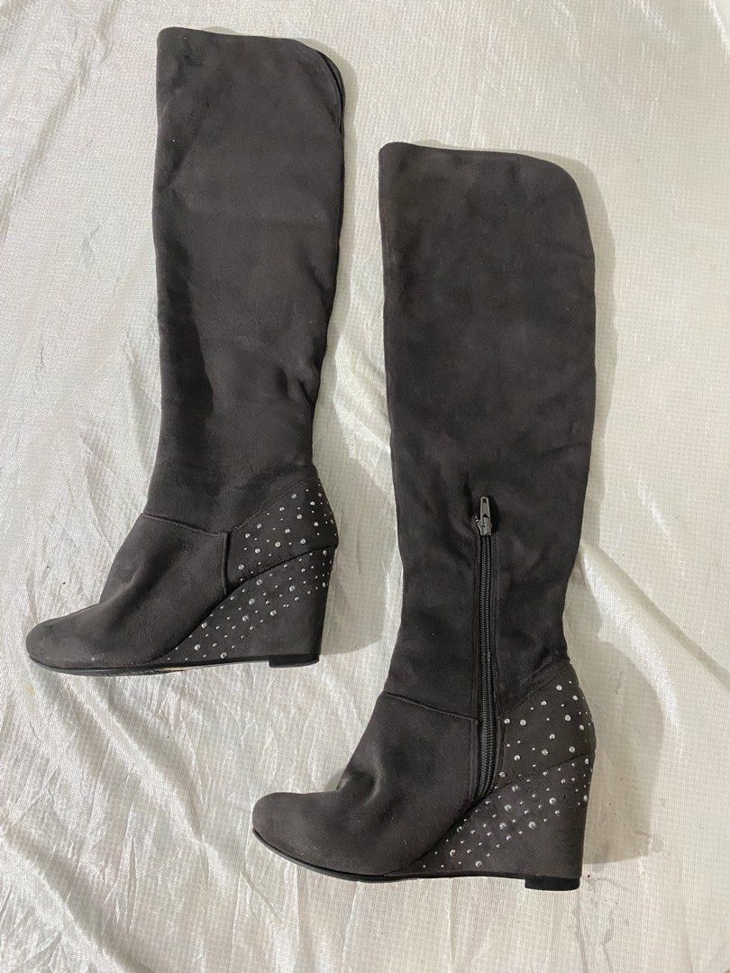 Knee-High / Over-the-Knee Wedge Boots (Category: Boots) located in Baguio. Submitted by sollunathrift13 (Listing ID 1468446513, Image 1). Description: size:36.5/37 Heel Style: Covered wedge heel with rhinestone/stud embellishments around the heel and back counter area. Closure: Side zipper closure for easy wear. Toe Shape: Rounded toe. Outsole: Black rubber sole with textured anti-slip traction pattern. Origin/Label: Japanese care label attached 